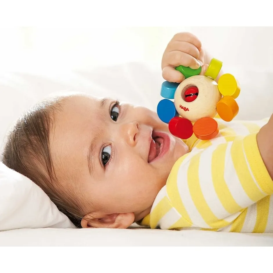 hochet_sonore_pour_bb_en__1.webp Haba Premiers Jeux D'éveil Et Accessoires Bébé>Hochet sonore pour bébé en bois - Jolie fleur